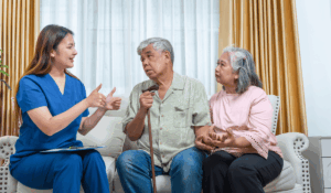 A doctor explaining a diabetes mellitus care plan to a patient while reviewing blood sugar results.