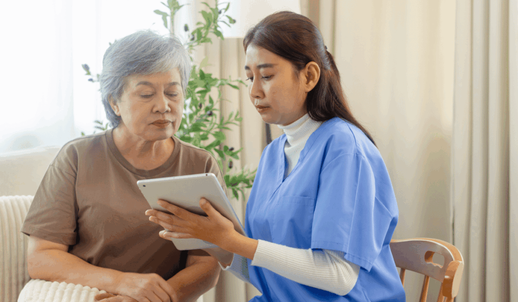 Doctor explaining prediabetes warning signs to a patient during a primary care consultation at IAMACF health clinic.